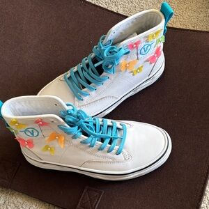 Vans White High-Tops with Blue Laces and Colorful Butterfly Accents